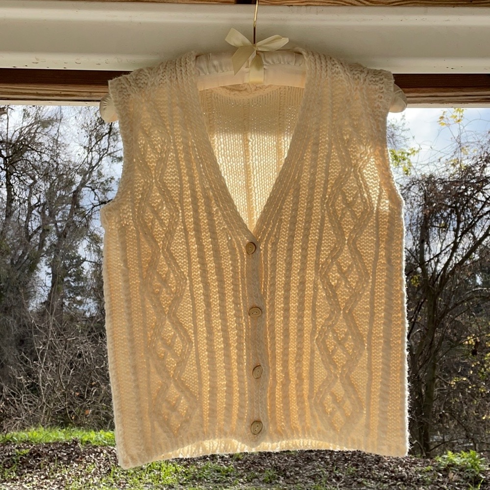 Knitted crocheted sleeveless cardigan vest